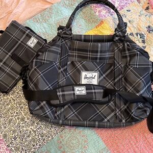 Herschel diaper bag in plaid NWOT